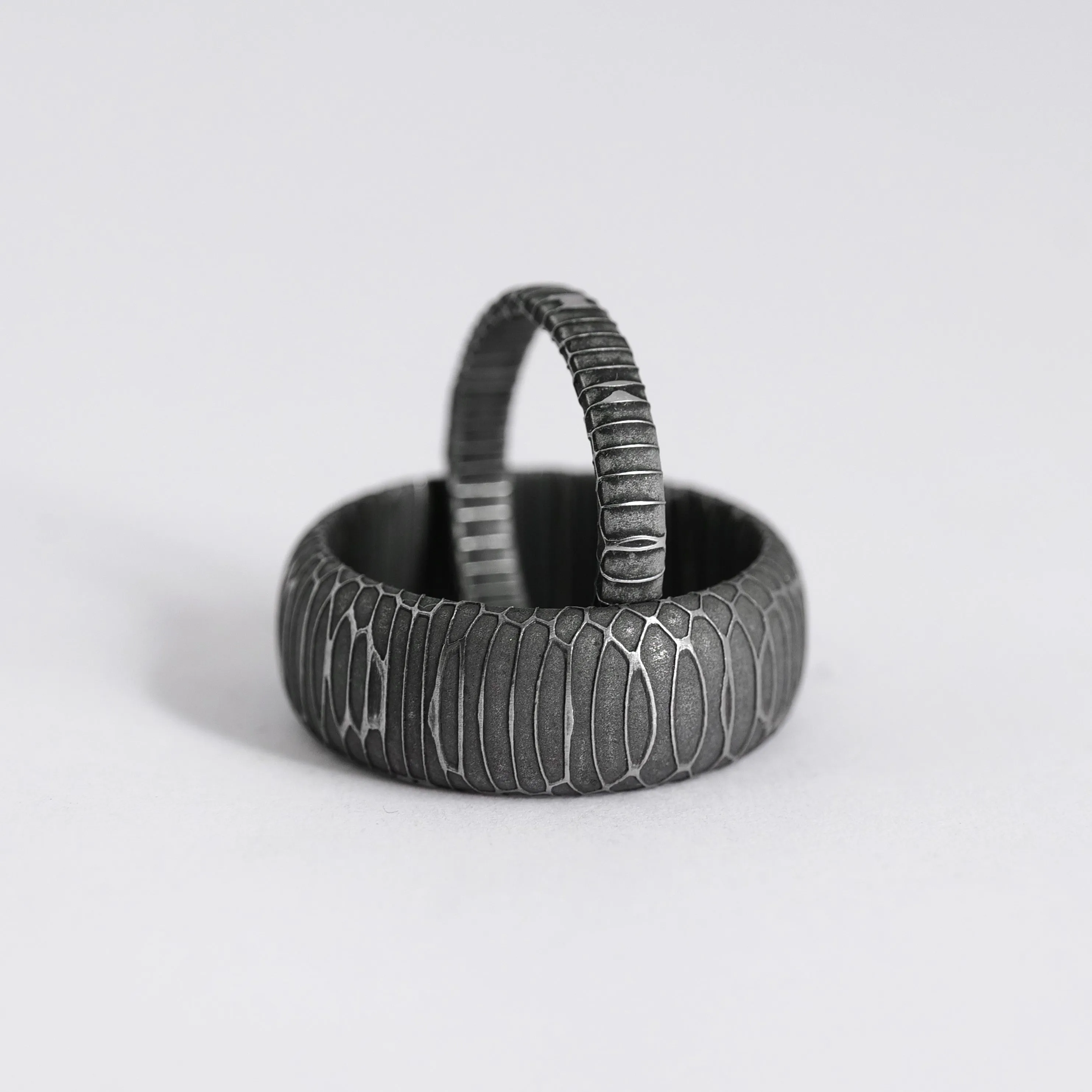 Matching His and Hers Spirograph Damascus Steel Wedding Rings