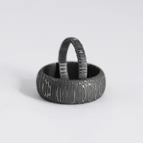 Matching His and Hers Spirograph Damascus Steel Wedding Rings