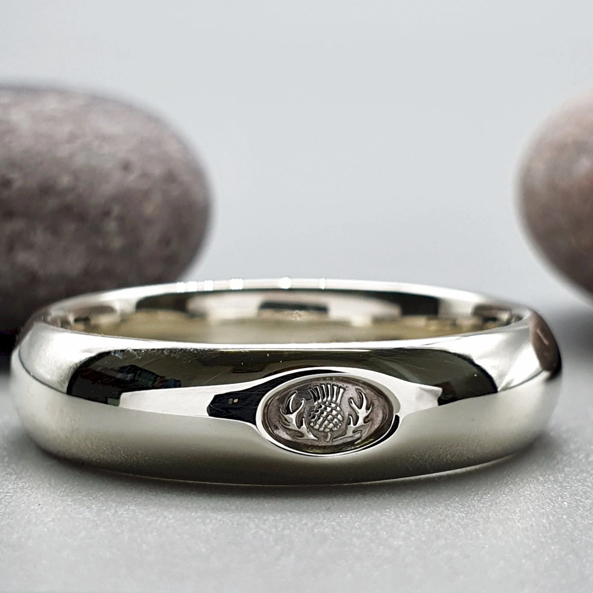 Silver wedding ring 5mm to 6mm Scottish Thistle medium court band.