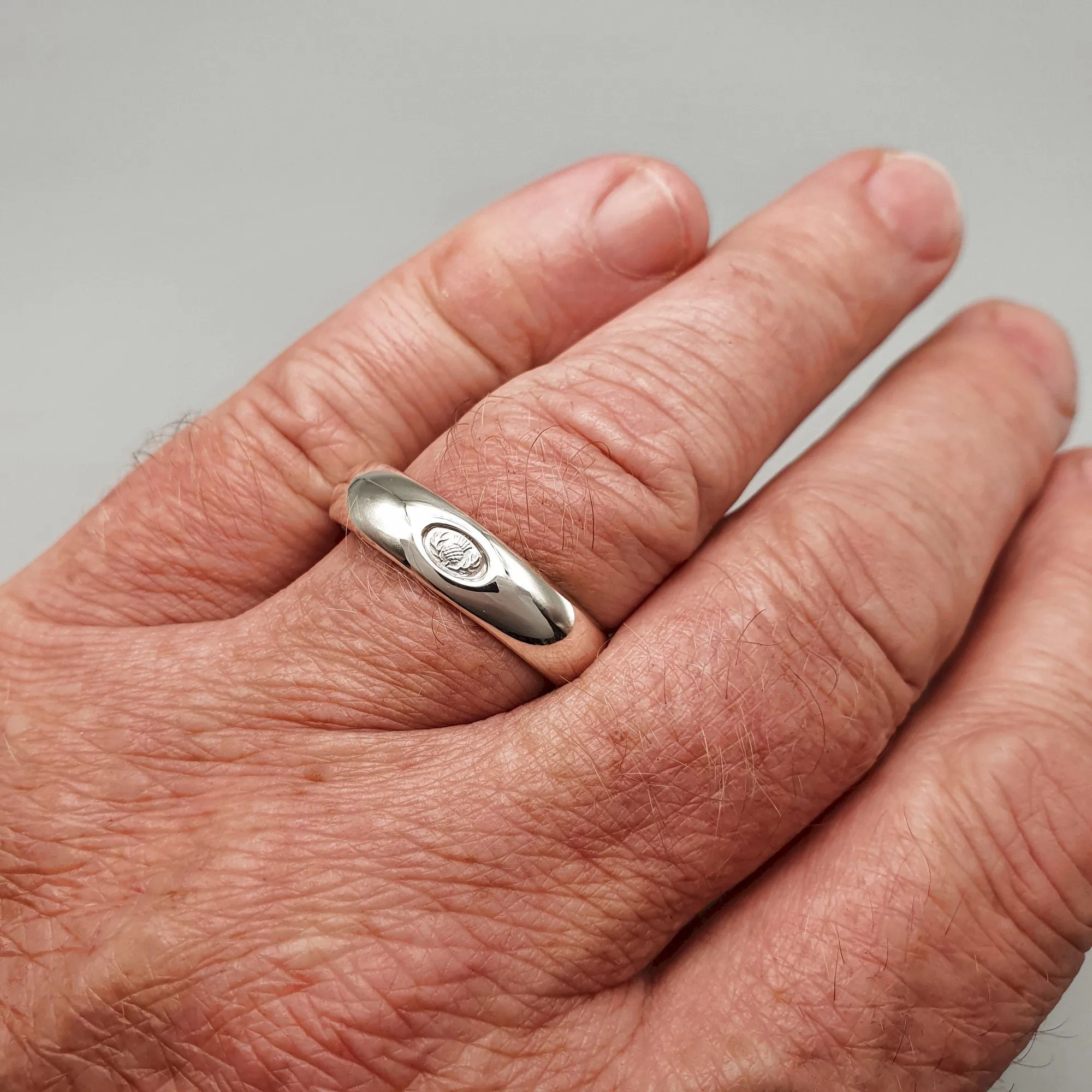 Silver wedding ring 5mm to 6mm Scottish Thistle medium court band.