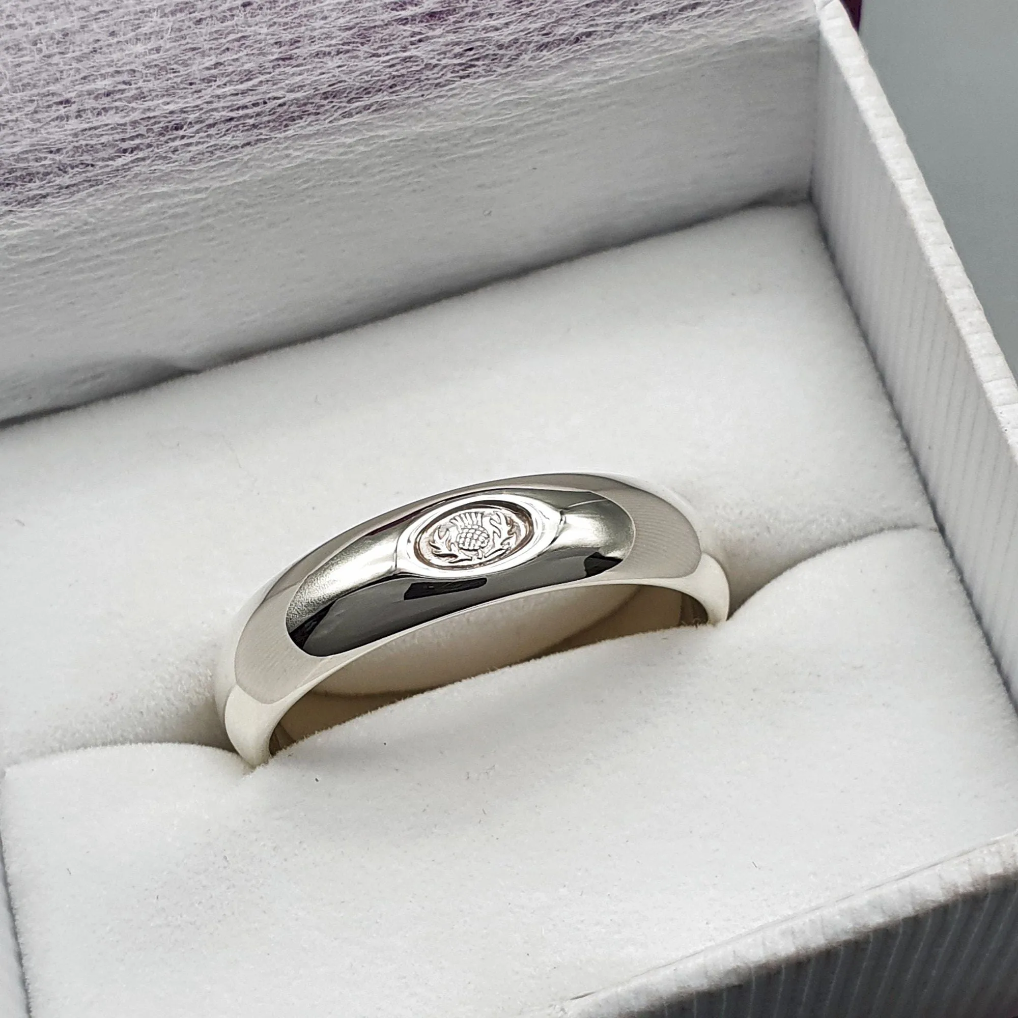 Silver wedding ring 5mm to 6mm Scottish Thistle medium court band.
